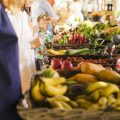 people-buying-vegetable-on-stall-at-the-market (1)