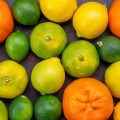 top-closer-view-fresh-juicy-tangerines-orange-colored-with-other-citruses-on-the-dark-desk-citrus-tropical-exotic-orange-fruit